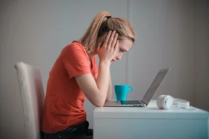 woman looking at the laptop