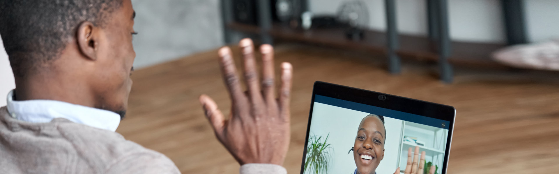 patient talking on conference video call to doctor