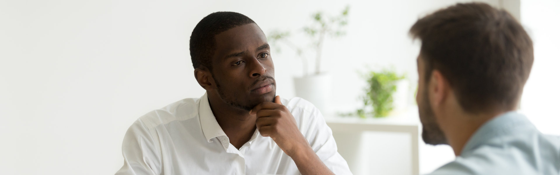 psychiatrist talking to his patient