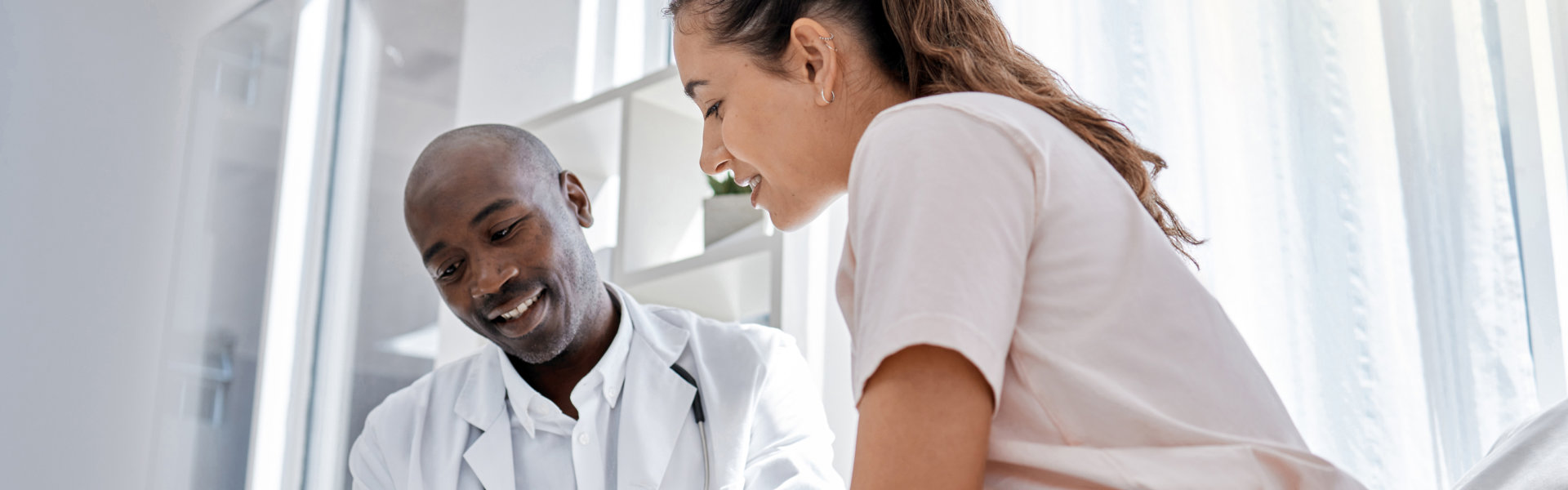 healthcare professional consulting a patient